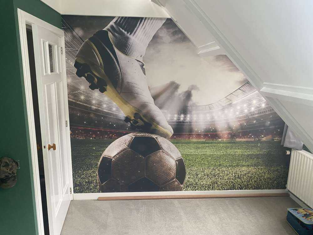 Joueur de football dans un stade
