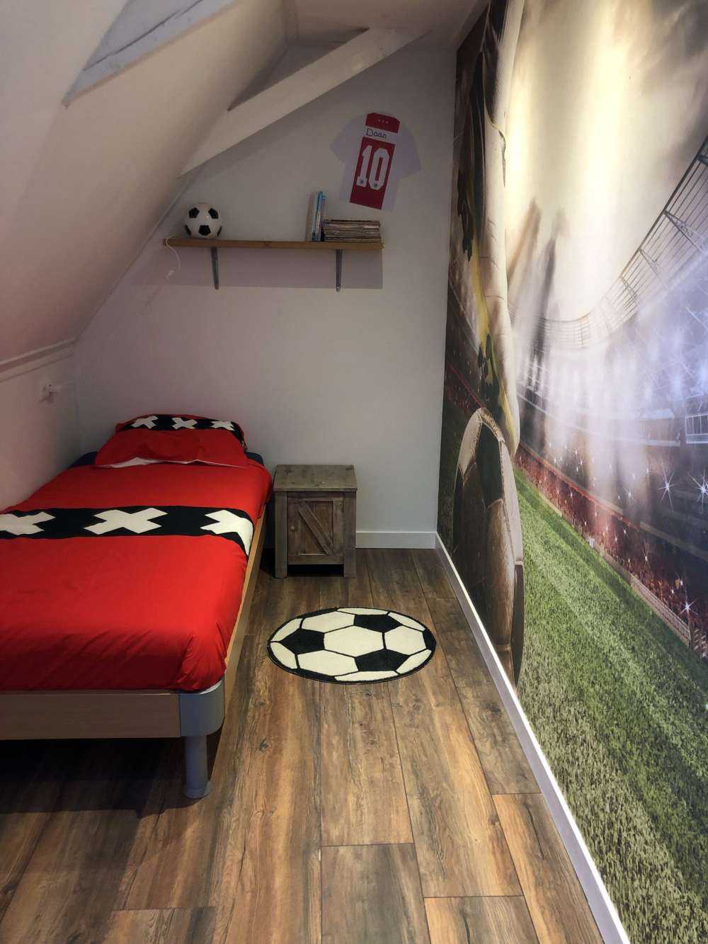 Joueur de football dans un stade