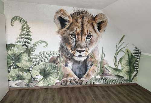 Bébé lion dans la jungle
