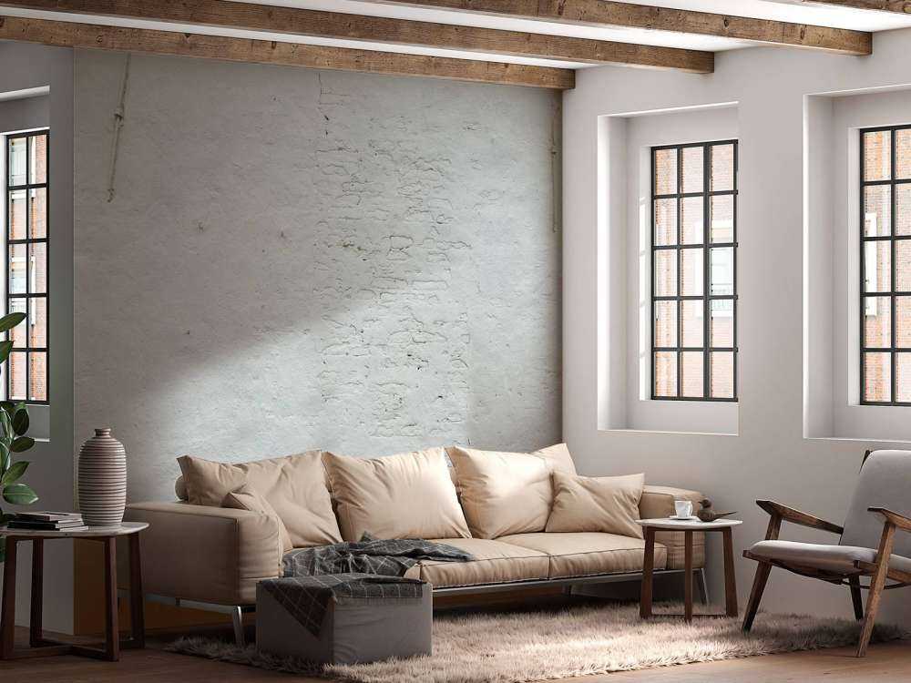 Mur de plâtre blanc et ancrages muraux