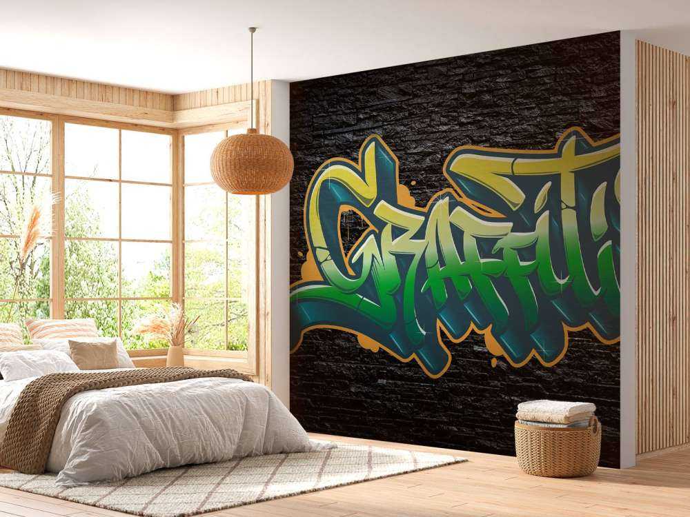 Graffiti sur un mur de briques noires