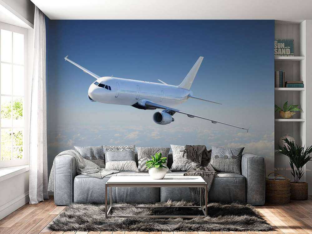 Un avion au-dessus des nuages