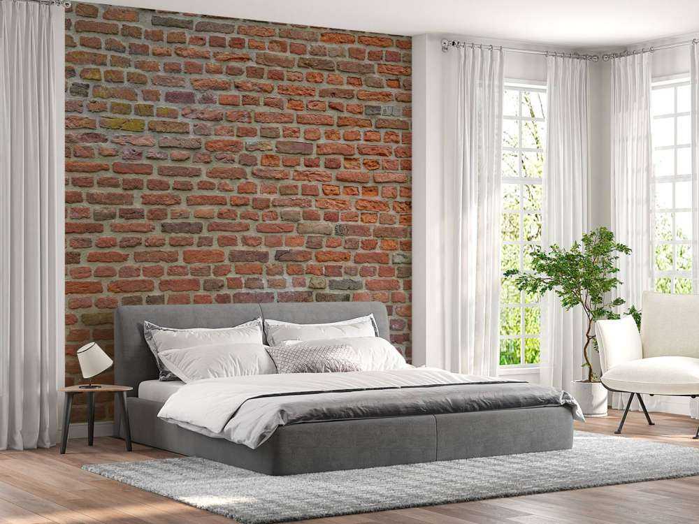 Mur avec de grandes et petites briques