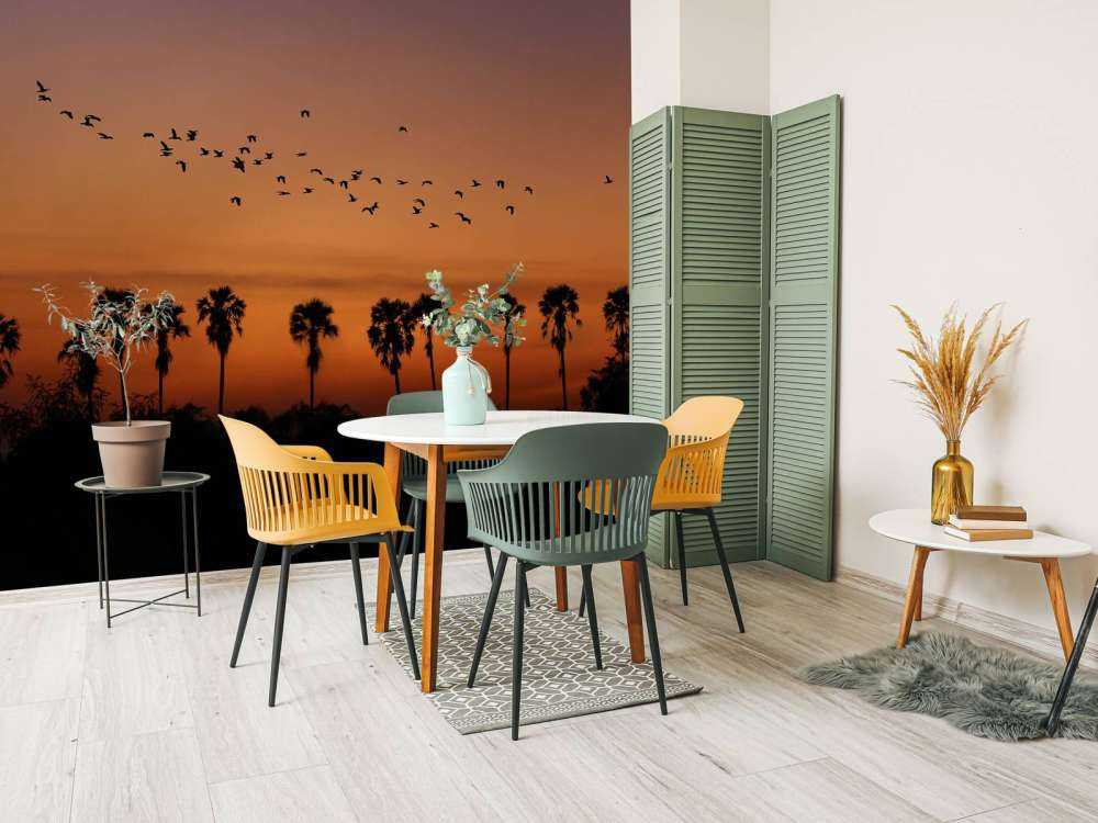 Palmiers avec groupe d'oiseaux