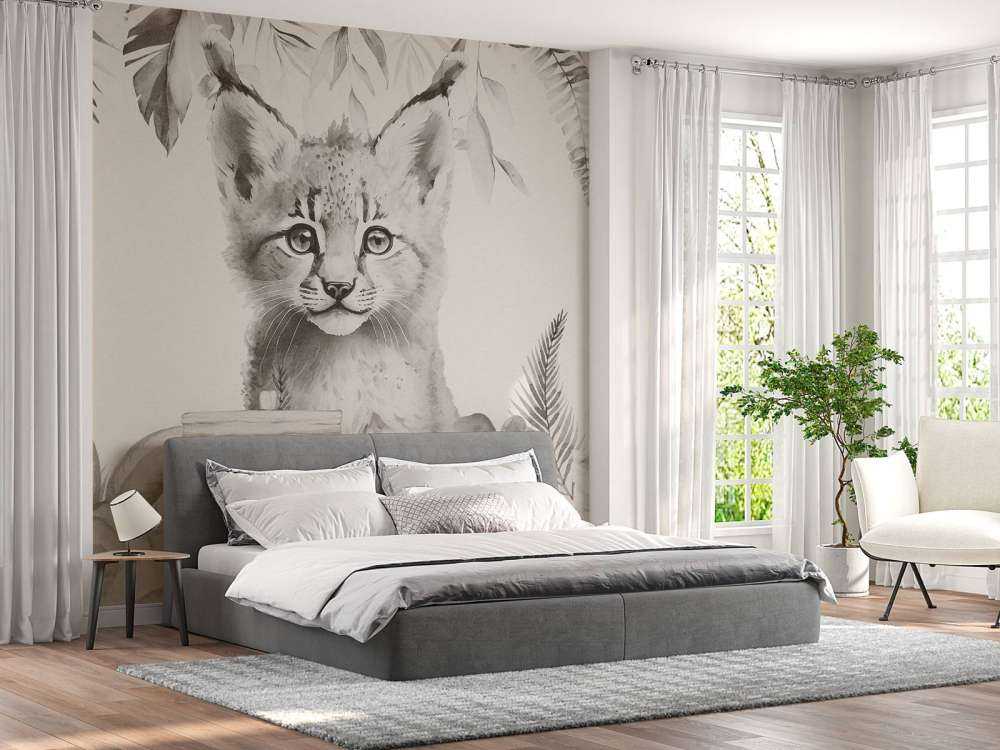 Bébé lynx dans la jungle beige