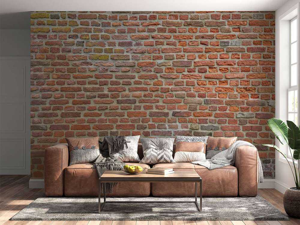 Mur avec de grandes et petites briques