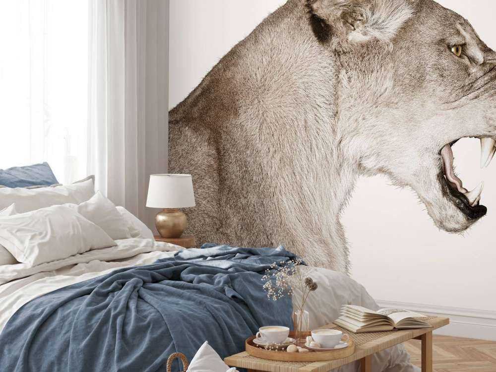 Lionne vue de côté blanc cassé