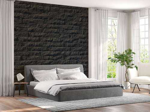 Mur avec des pierres sombres