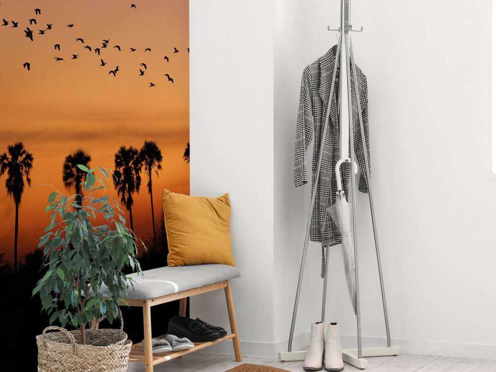 Palmiers avec groupe d'oiseaux