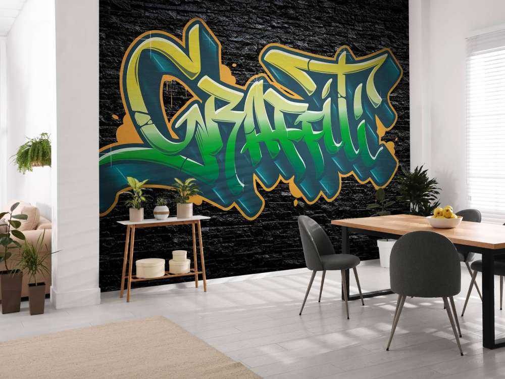 Graffiti sur un mur de briques noires