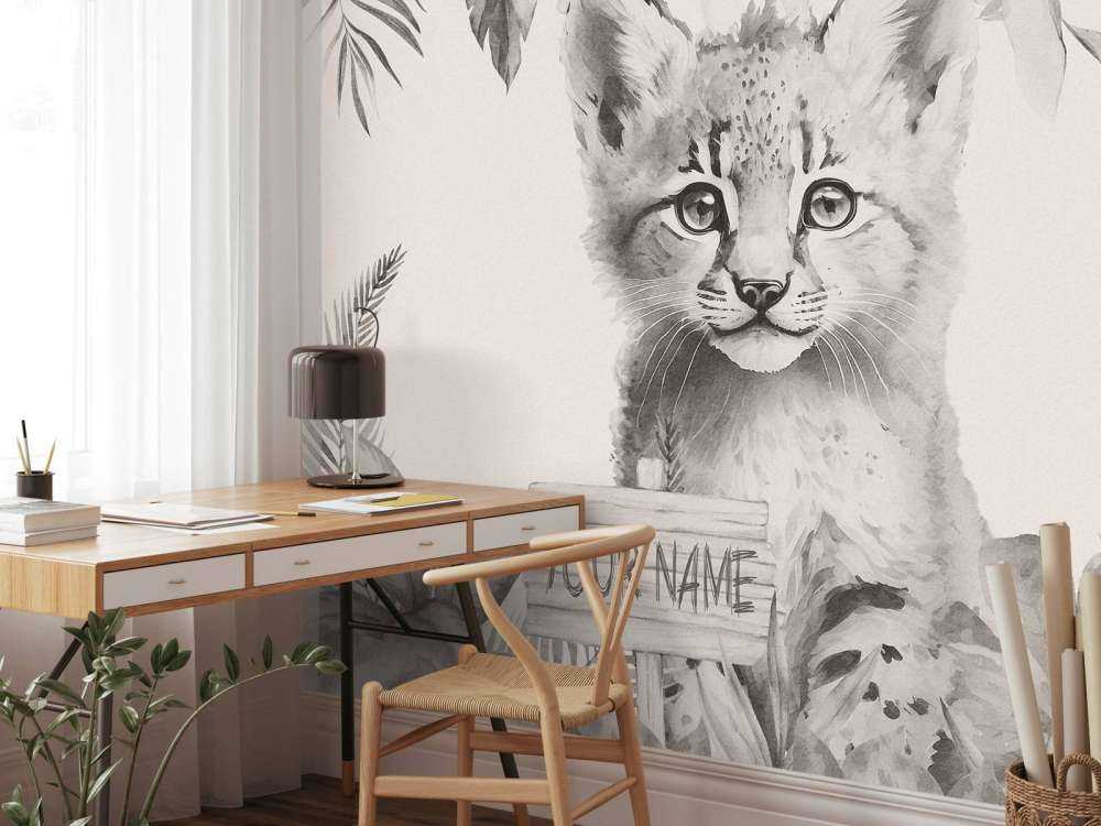 Bébé lynx dans la jungle beige