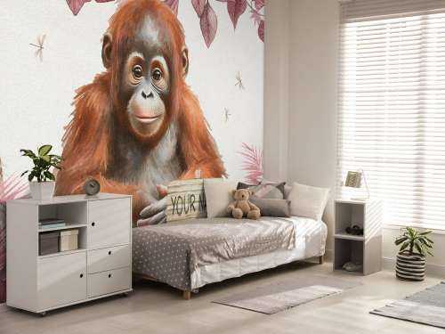 Jeune orang-outan dans la jungle rose