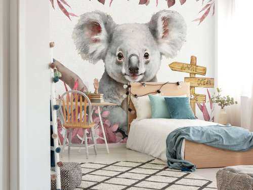 Bébé koala dans la jungle rose