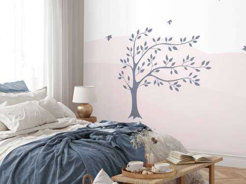 Des collines roses avec un arbre