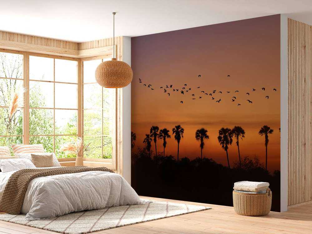 Palmiers avec groupe d'oiseaux