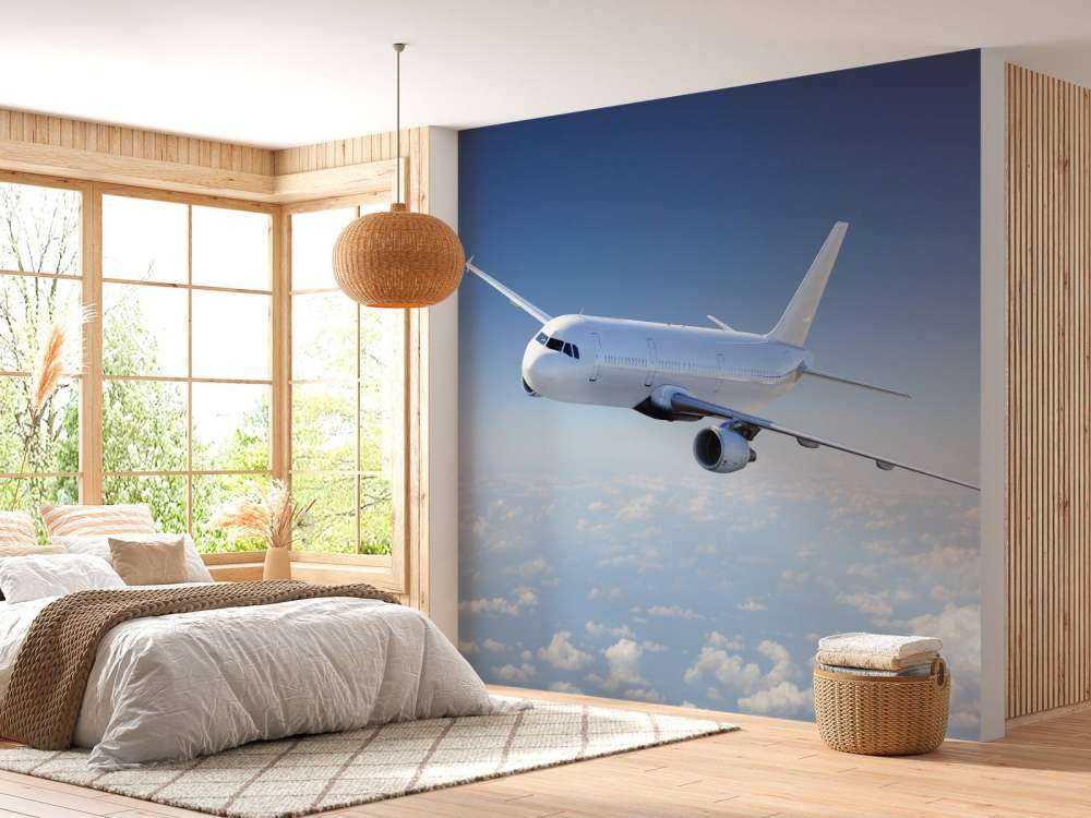 Un avion au-dessus des nuages