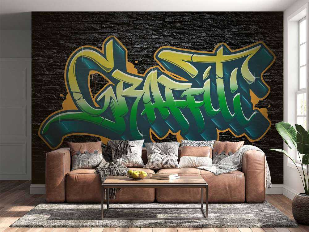 Graffiti sur un mur de briques noires