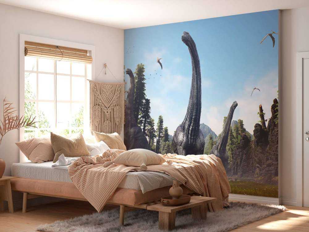 Groupe d'Alamosaurus marchant dans une vallée