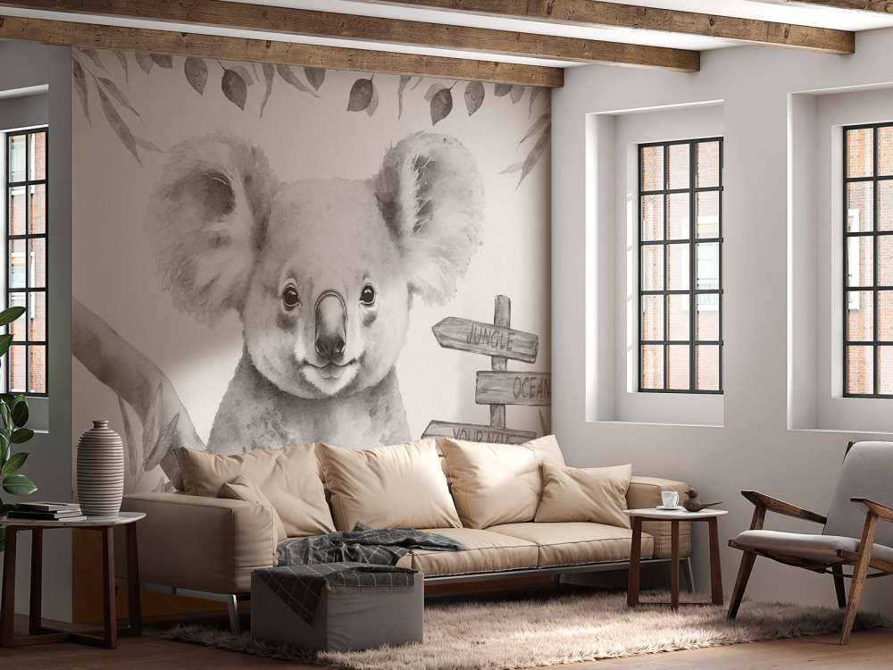 Bébé koala dans la jungle beige