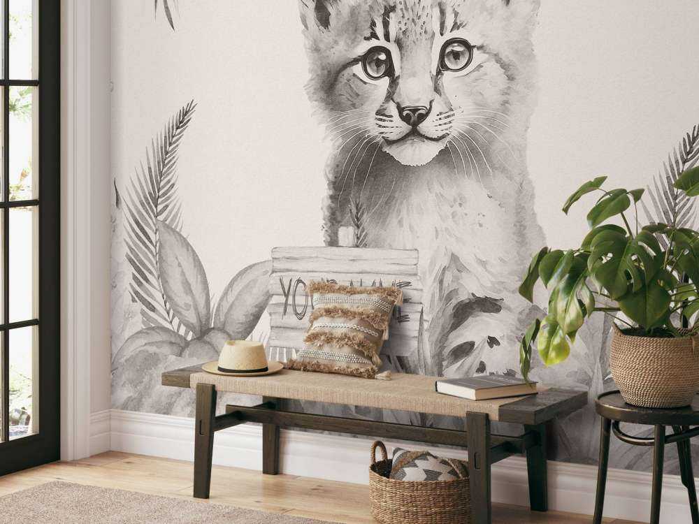 Bébé lynx dans la jungle beige
